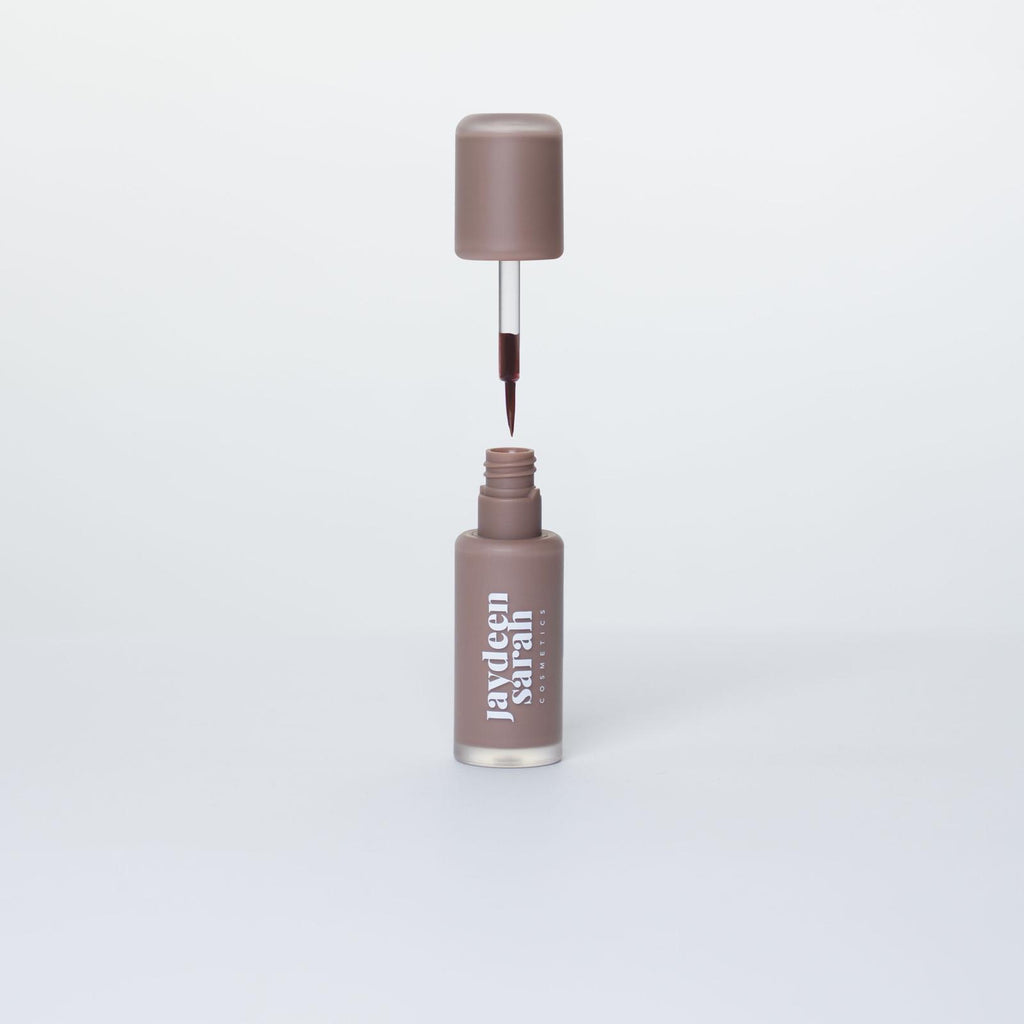 Liquid lip liner stain with brush applicator