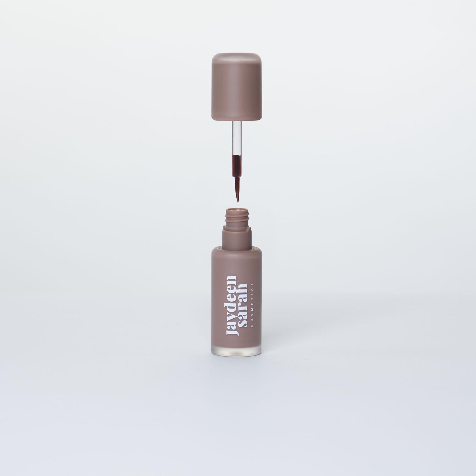Liquid lip liner stain with brush applicator