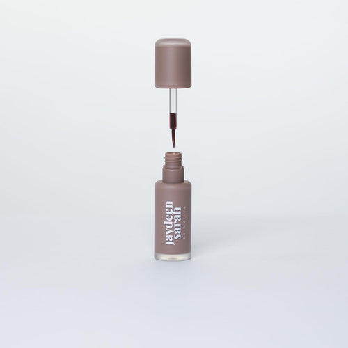 Liquid lip liner stain with brush applicator