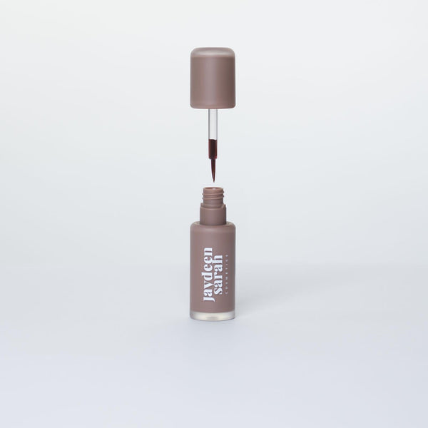 Liquid lip liner stain with brush applicator